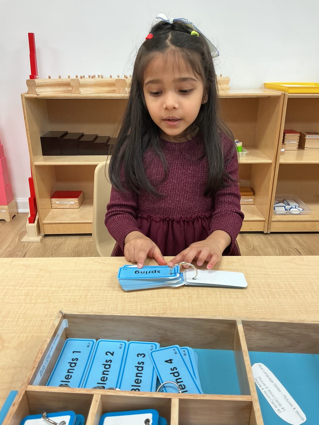 A child deep in concentration during the work cycle