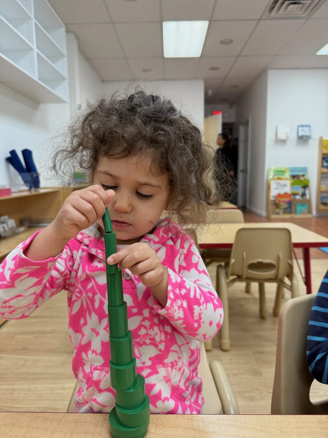 A child working with Montessori materials